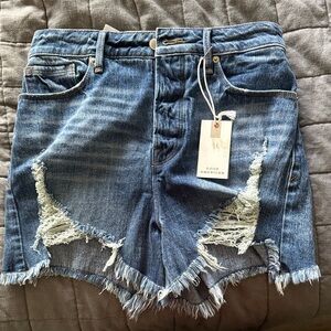 Good American Bombshell Blue Distressed Denim Shorts